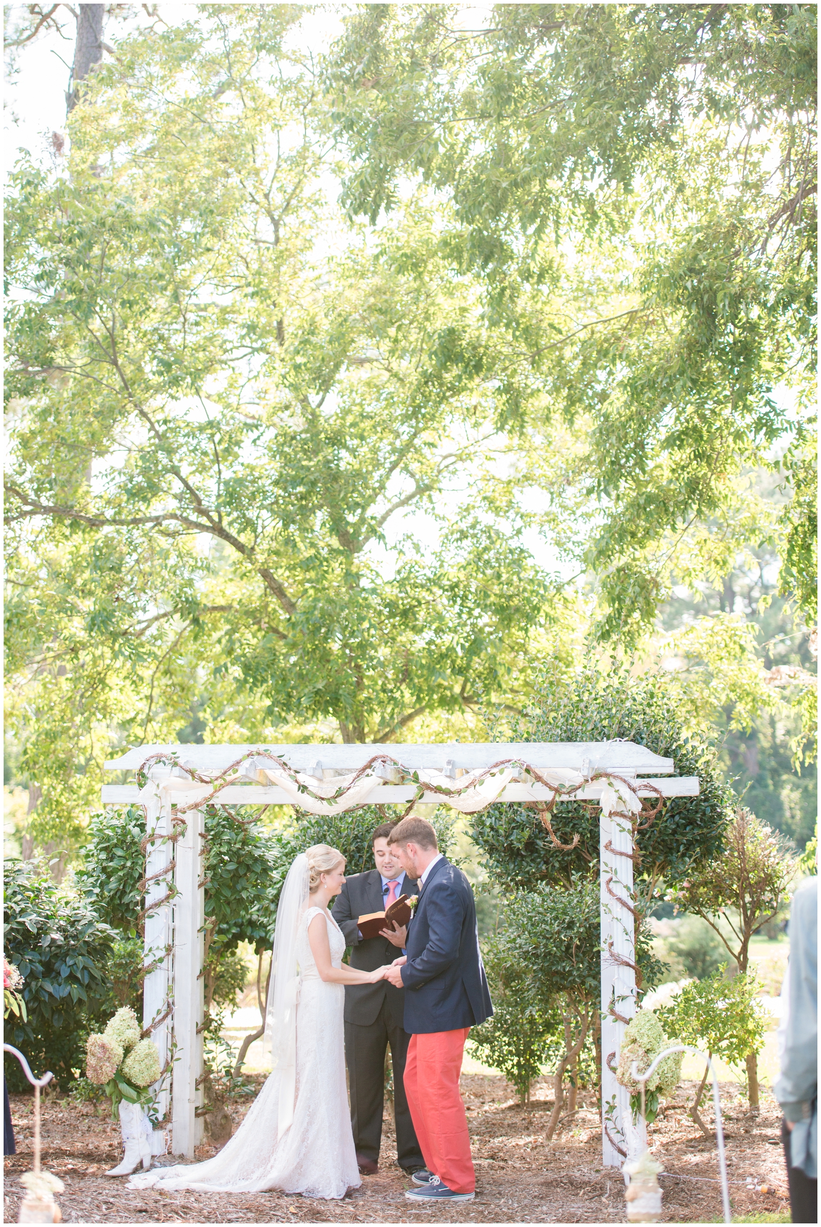 navy and coral nautical rustic backyard yorktown virginia wedding waterfront cowboy boots