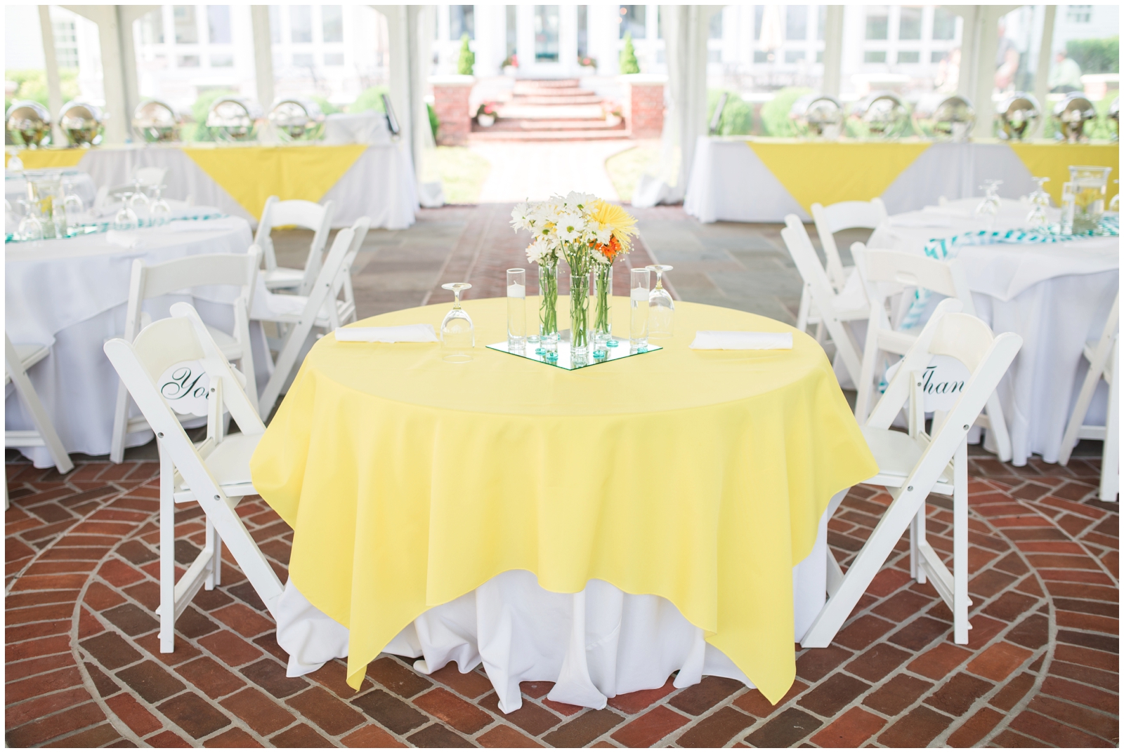 virginia plantation estate wedding inn at warner hall teal and yellow daisy 